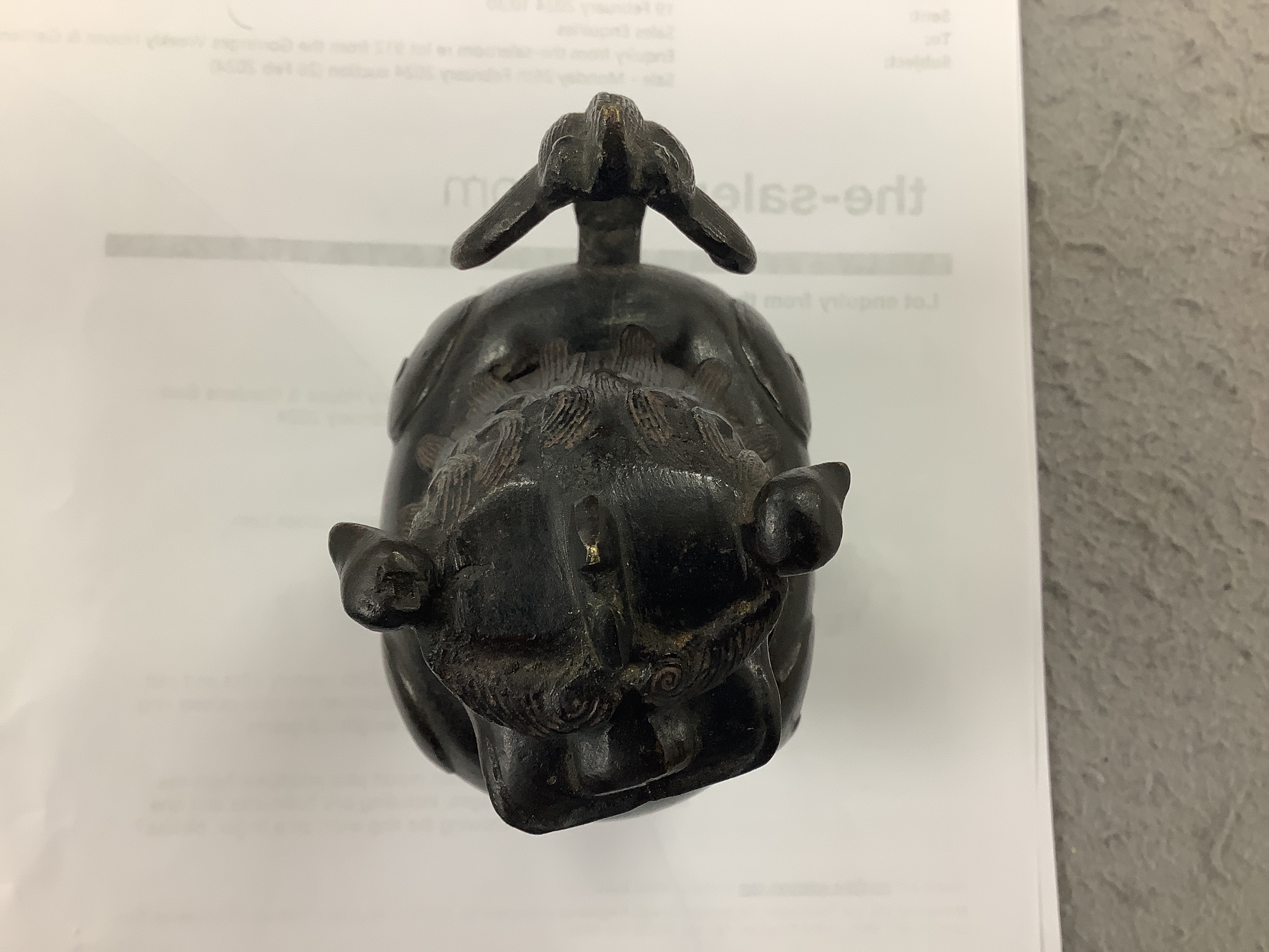 A Chinese bronze mythical beast censer and cover (Luduan), 17th century, the cover with pierced mouth, 9cm in length